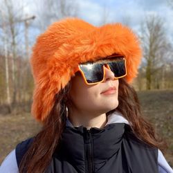 orange-pumpkin bucket hat made of faux fur. cute fuzzy bucket hats. fluffy warm hat. festival fuzzy hat. rave shaggy hat