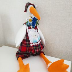 stork with baby soft toy