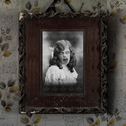 creepy vintage photo girl demon. vintage scary vintage photo screaming demon (digital)