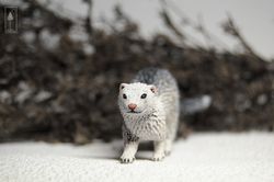 silver ferret figurine
