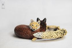 two fantasy foxes figure