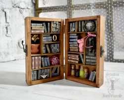 a miniature library with minibooks the bookshelves in the living room