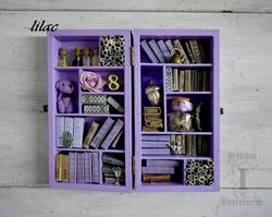 a miniature library with minibooks the bookshelves in the living room