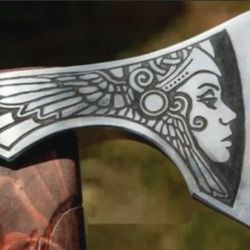 experience the thrill of the hunt with our handmade steel hunting axe