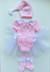 hand knit elf clothing set for baby girl: pink and white romper with tulle skirt, hat and socks.