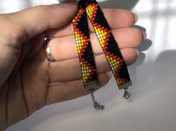 beaded loom handmade bracelet geometric print black red yellow color seed bead boho bracelet waves woven weaving native