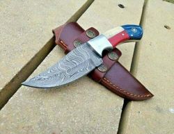 texas-sized durability: hand forged damascus steel hunting knife with texas flag design