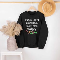 candy cane wishes and mistletoe kisses christmas sweatshirt,family matching shirt,christmas eve shirt,christmas celebrat