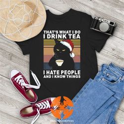 that's what i do i drink tea i hate people and i know things vintage t-shirt, cat shirt, black cat shirt, gift tee for y