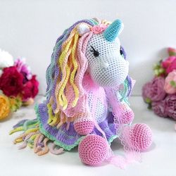 crochet animal. unicorn toy white, pink, blue