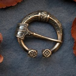 viking fibula with norse ornament. viking brooch. norse style