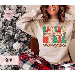 santa's favorite nurse sweatshirt gift for christmas, groovy emergency nurse sweatshirt, retro er nurse gift, vintage ic