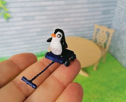 Penguin on a cart. Doll miniature.1:12.