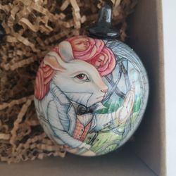 christmas ball "alice in wonderland". hand painted. wood base.