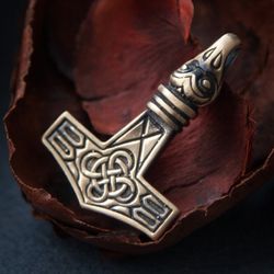 thors hammer pendant with raven and knot. viking jewelry. mjolnir pendant