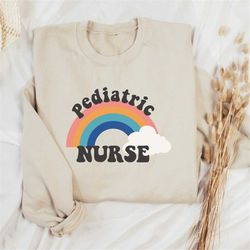 pediatric nurse sweatshirt, nurse sweater, rainbow nurse shirt, pediatric nurse graduation gift, nursing student sweater