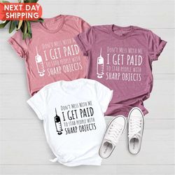 don't mess with me i get paid to stab people with sharp objects, new nurse gift shirt, nurse life shirt, nursing school
