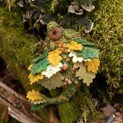 sleeping forest dragon with acorn hat and mushrooms