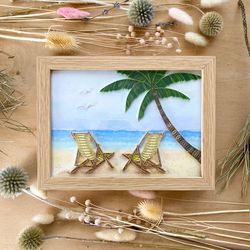framed picture of tropical view with the seashore and coconut palm