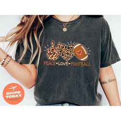 peace love and football shirt, football season shirt, football lover, football shirt, leopard football shirt, game shirt