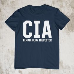 cia female body inspector, oddly specific shirt, funny