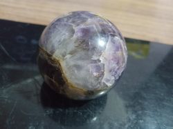 enchanting amethyst crystal sphere: a perfect blend of beauty for decor, meaningful gifting, and healing