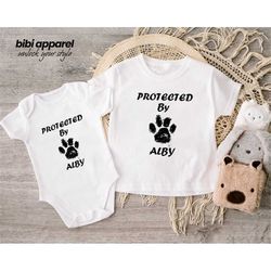 protected by dog onesie, newborn outfit, custom baby shower gift, cute sibling bodysuit