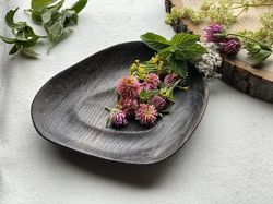 unique wooden plate made of natural bog oak, wood age 5000 years
