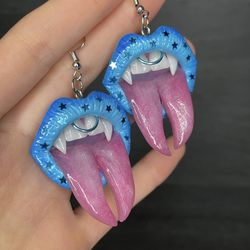 earrings. blue lips earrings with fangs.