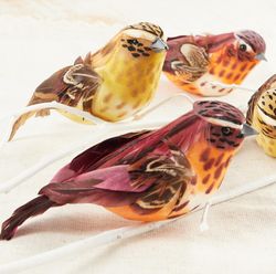 assorted brown and yellow artificial feather birds