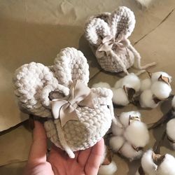 booties with ears for children. crochet booties. knitted plush booties. boots of a year's work. booties for home.