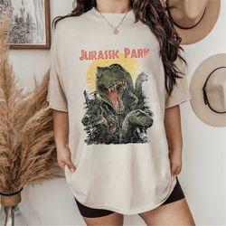 vintage jurassic park comfort colors shirt, jurassic park logo dinosaur shirt, retro jurassic park movie shirt, universa