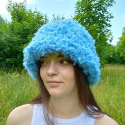 curly faux fur hat in a blue. festival fuzzy hat. cute bucket hat. style curly hat. bright blue fluffy fur panama hat.