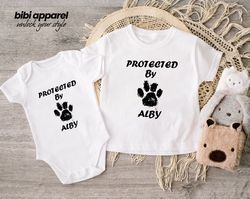 protected by dog onesie, newborn outfit, custom baby shower