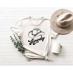 howdy hat t-shirt , faux cowhide, country western shirts, rodeo fashion, cowgirl style, christmas gift shirt, country mu