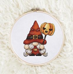 gnome with pumpkin candy cross stitch