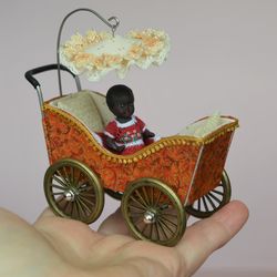 miniature toy stroller for two small dolls. handmade miniature stroller for small dolls.