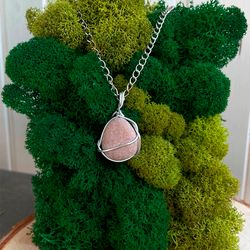 pendant with necklace made of natural stone on a silver-plated chain.