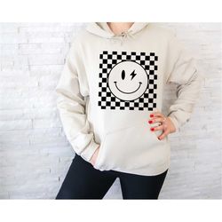 checkered smiley face sweatshirt and hoodie, smiley sweatshirt, smiley face hoodie, unisex sweatshirt and hoodie for gif