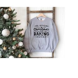 the official christmas baking squad sweatshirt,baking christmas shirt,baking squad sweatshirt,holiday baking shirt,bake