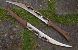 united cutlery the hobbit the fighting knives of tauriel with certificate of authenticity & wooden wall plaque uc3044