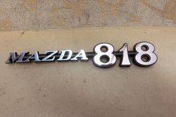 mazda 818 emblem badge in metal