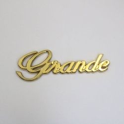 toyota grande emblem in golden