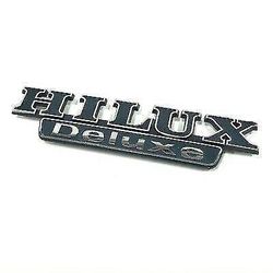 toyota hilux delux emblem in metal