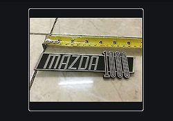 mazda 1000 car emblem