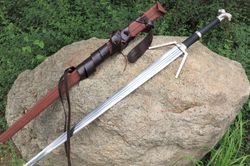 the witcher sword - swords of geralt of rivia - great sword and feline sword - griffin silver sword - engraved sword -