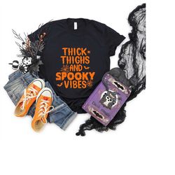 thick thighs and spooky vibes - halloween shirt, halloween shirts, halloween t-shirt, halloween tee, halloween tees, fun
