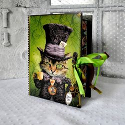 a green box-book with for cards or jewerly for storage alice fans