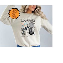 in a  galaxy far far away sweatshirt, star wars galaxy sweater,light sabers sweater,death star sweater,tie fighter sweat