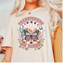 boho christian shirt, trendy christian shirts, transformed by christ tee, christian appare, retro vintage religious tee,